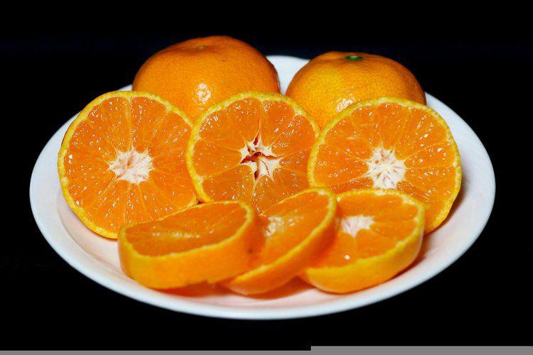 Rodajas de naranja para confitar o hacer naranja confitada