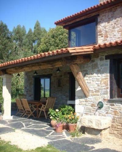 Fachadas de casas rústicas de piedra