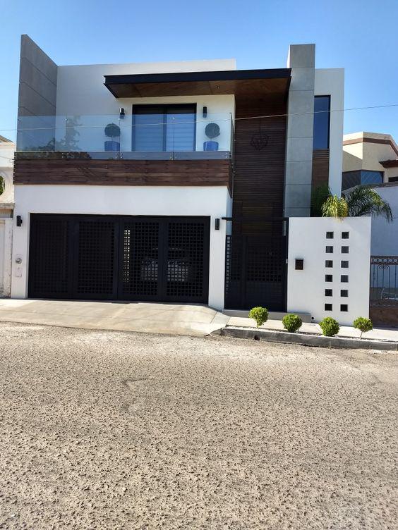 Fachadas de casas de dos pisos