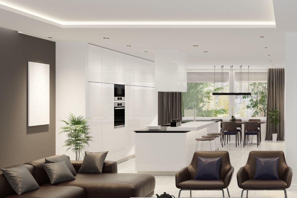 Cocinas minimalistas con isla y armarios continuos.