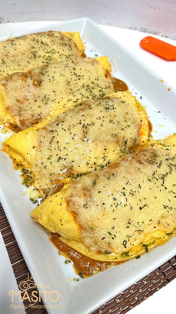 Receta de tortilla rellena de salsa boloñesa