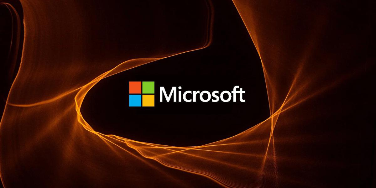 Logo de Microsoft sobre fondo de fuego