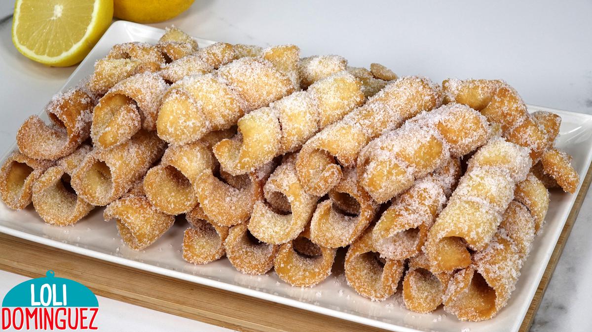 DULCES DE SEMANA SANTA. Rizos Extremeños una receta tradicional fácil y deliciosa. Estos dulces quedan crujientes y al morderlos se deshacen en la boca con una textura ligeramente hojaldrada