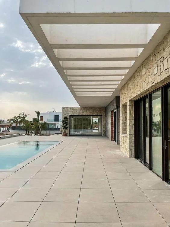 Pergolado de concreto para área de piscina