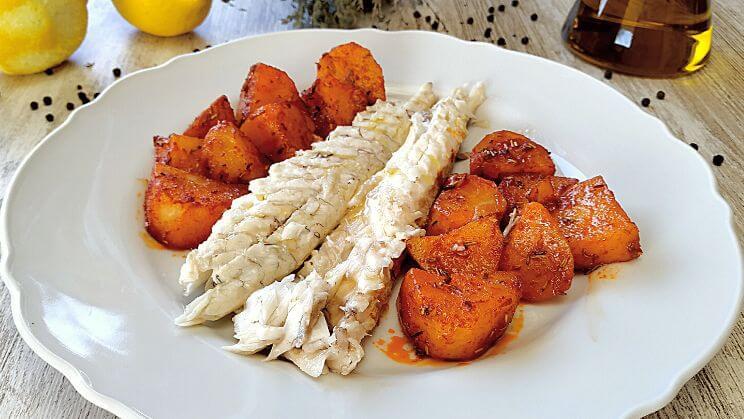 Lubina a la sal con patatas especiadas