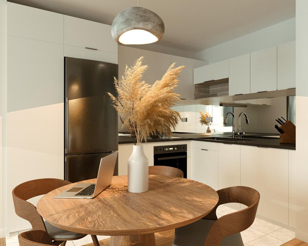 Pequeña cocina en un piso conectada al salón