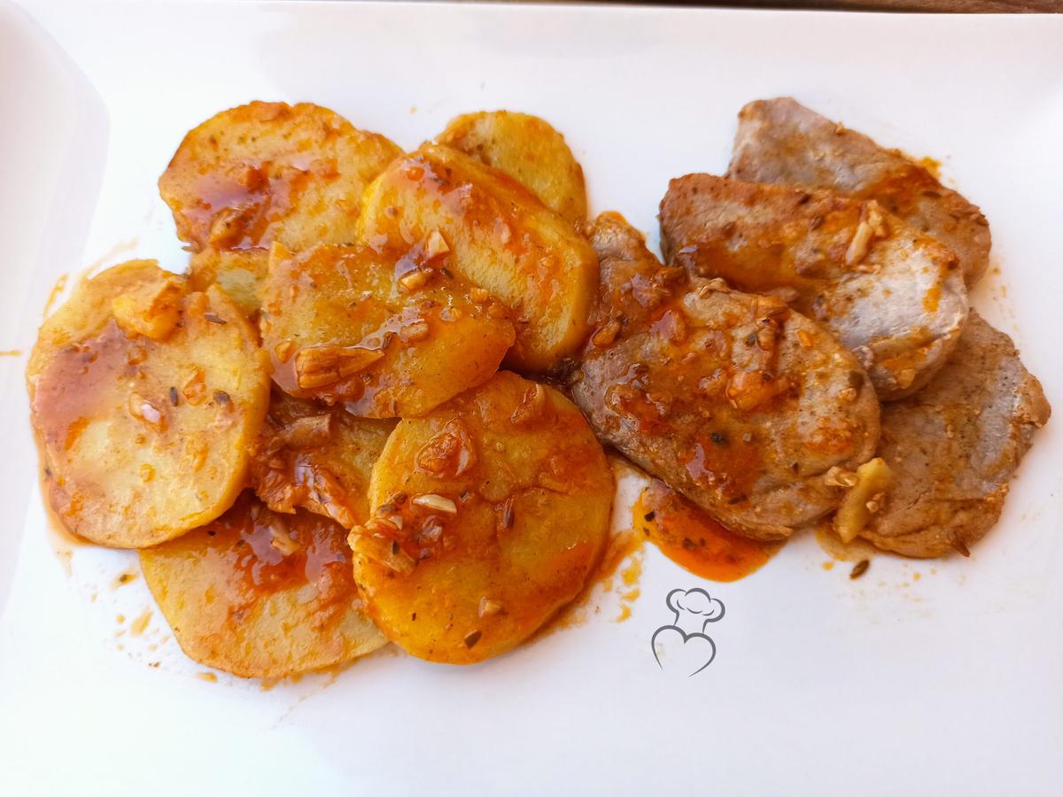 Patatas al ajillo pastor con solomillo de cerdo