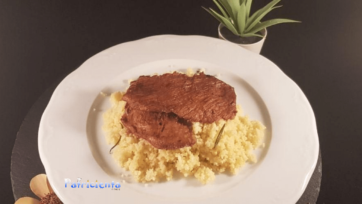 Secreto al vinagre balsámico con cuscús de ajo