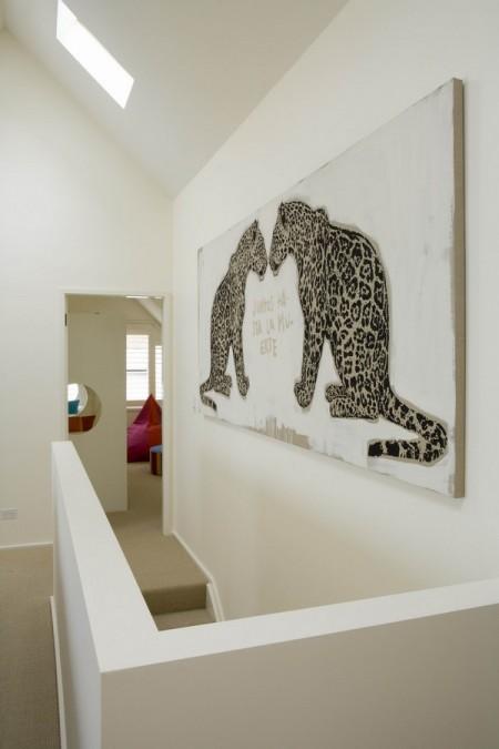 ventilador en el techo sofá gris sillones de mimbre objetos para el hogar étnicos moqueta de fibra natural madera de nogal madera de haya litera modernas habitación infantil con literas blancas diseño de interiores decoración en tonos crema y naturales decoración en blanco y madera decoración de interiores decoración con madera artículo para el hogar del mar 