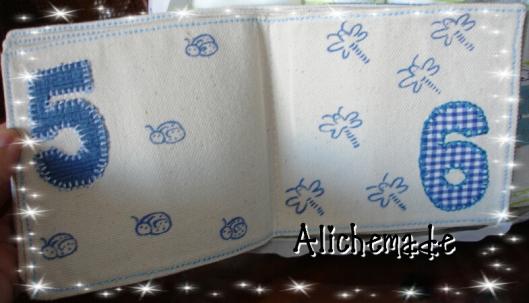 Páginas 5 y 6 del libro de tela con números y animalitos para niños.