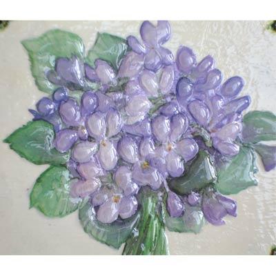 Detalle de decoupage con relieve