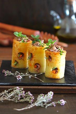 Cilindro de patata con jarrete trufado