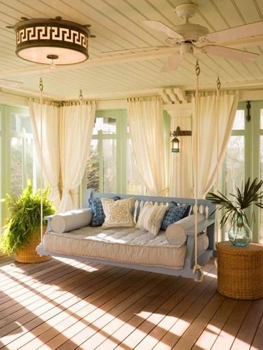 cozy-sunroom-with-a-hanging-sofa
