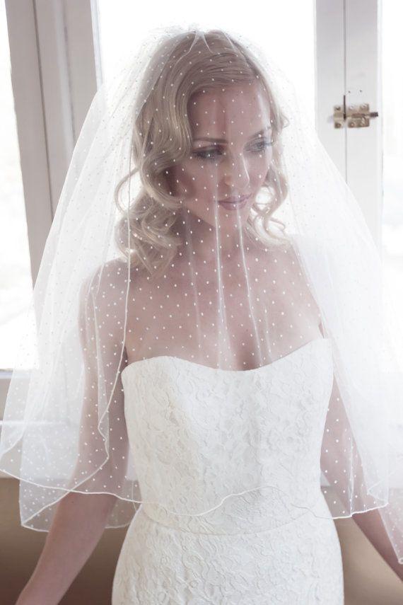 Velo de novia a la altura del codo