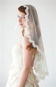 Velo de novia a la altura del codo