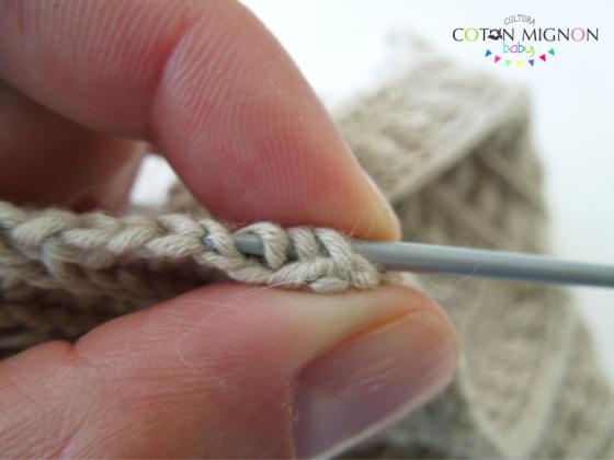 Cojer puntos para tejer la franja del hombro