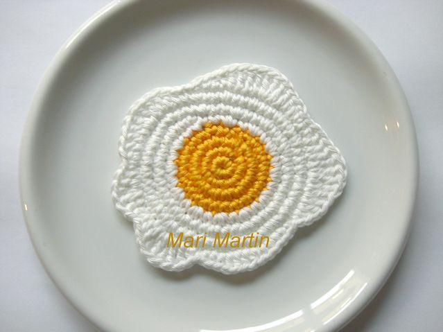 Crochet Coasters Eggs. Looks like a crochet spiral with a bit of freeform crochet around the edges. Easy enough and I Love it!