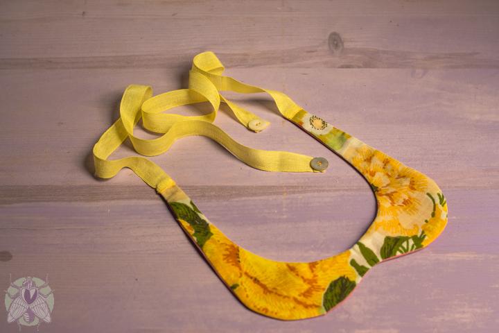 yo le cosi botones en los extremos 14