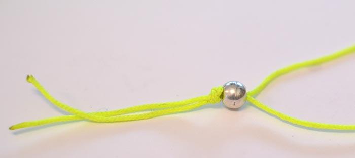 Bolita para cerrar el collar asimetrico