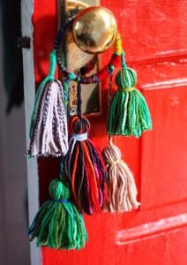 Decoración para la puerta con lanas