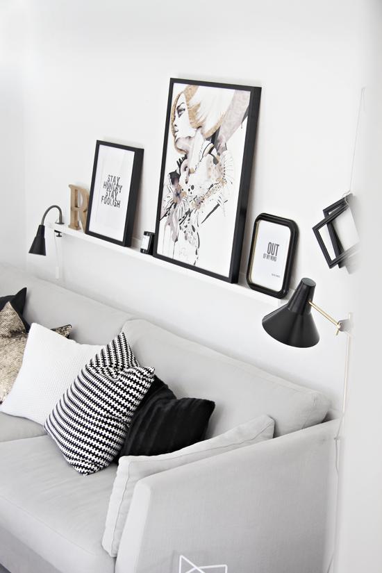 Decorar las paredes con cuadros.