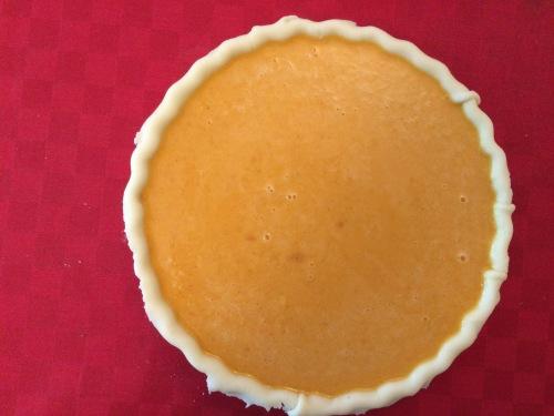 Añadiendo la mezcla de calabaza a la masa