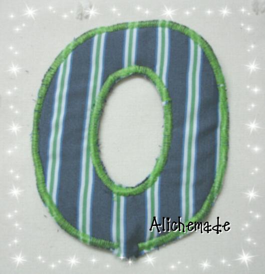 Letra de tela, inicial del gemelo O.