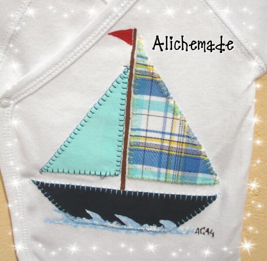 Detalle del barco aplicado y pintado a mano.