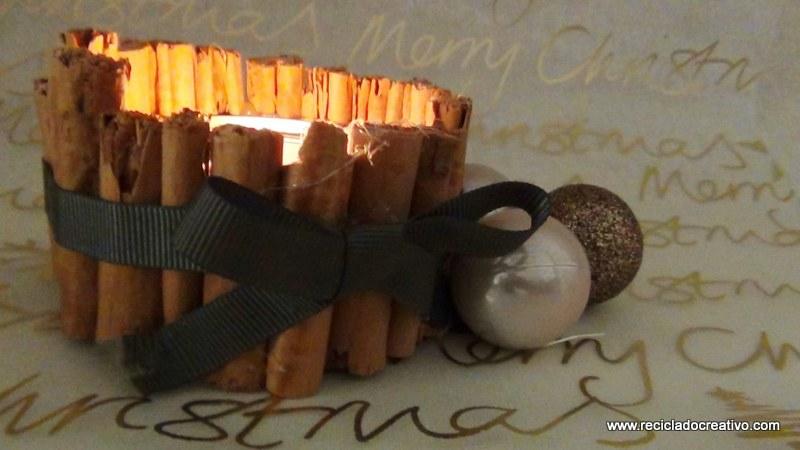 Portavelas con ramitas de canela, reciclando latas de atún