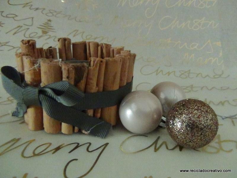 Portavelas con ramitas de canela, reciclando latas de atún