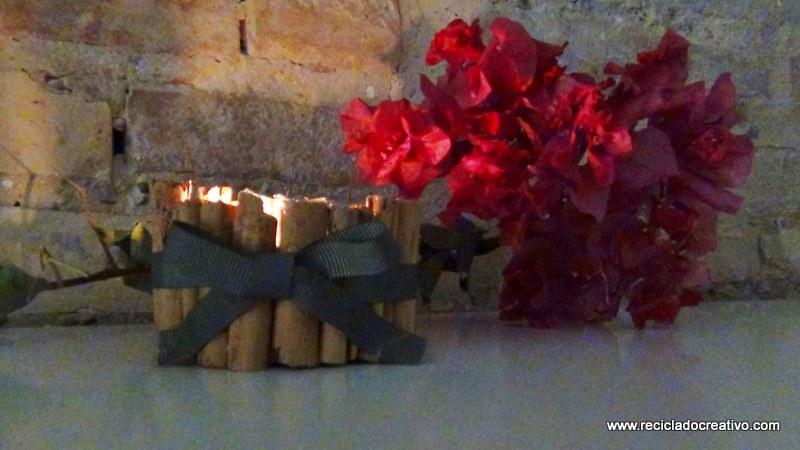 Portavelas con ramitas de canela, reciclando latas de atún