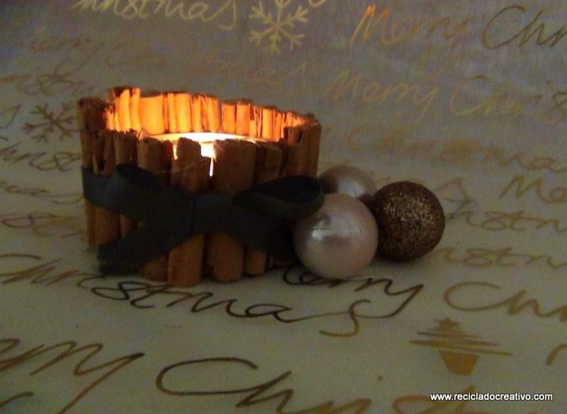 Portavelas con ramitas de canela, reciclando latas de atún