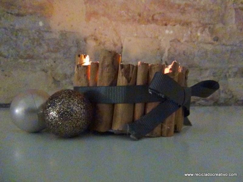 Portavelas con ramitas de canela, reciclando latas de atún