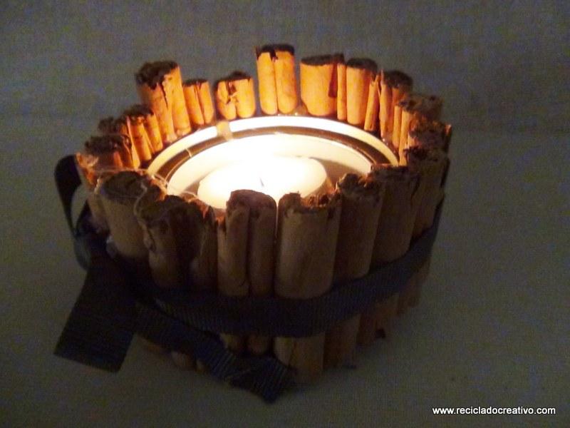 Portavelas con ramitas de canela, reciclando latas de atún