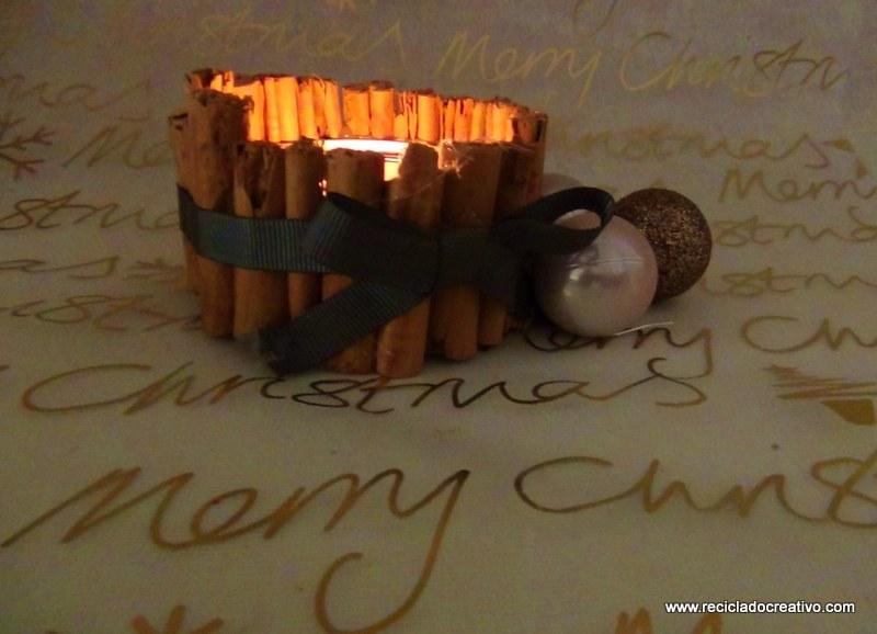 Portavelas con ramitas de canela, reciclando latas de atún