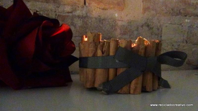 Portavelas con ramitas de canela, reciclando latas de atún