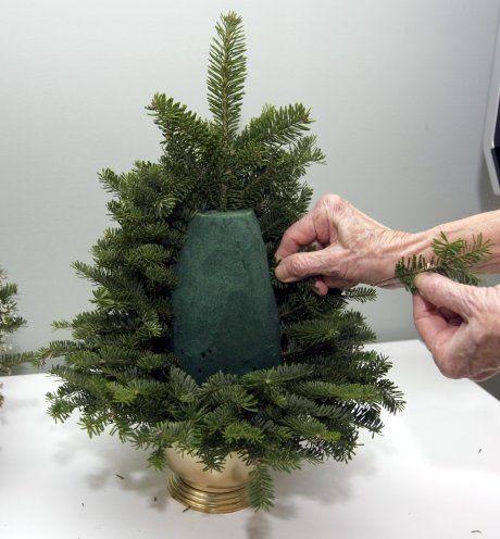 DIY: Table Top Christmas Tree made from fresh evergreen clippings.