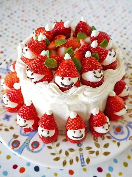 Cake with strawberry Santas!