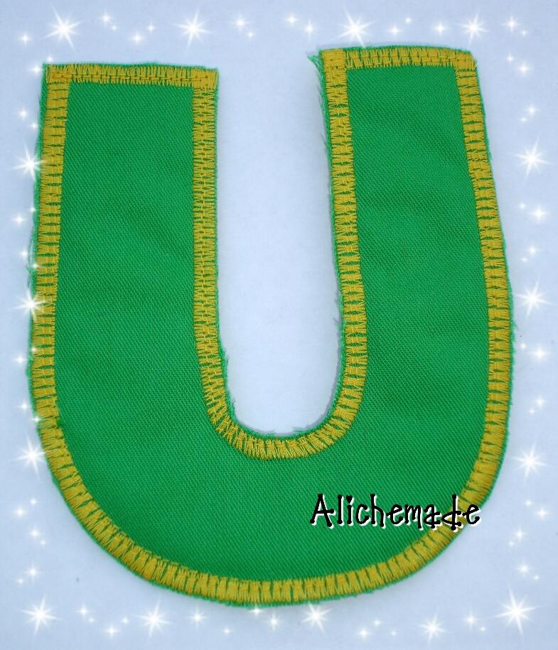 Letra de tela reversible, U.