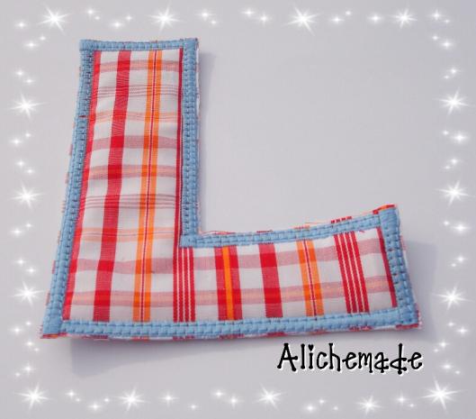 Letra de tela reversible, L.