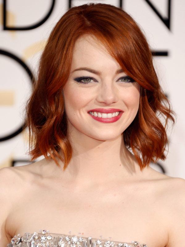 Emma Stone tinte pelo cobrizo Globos de oro 2015