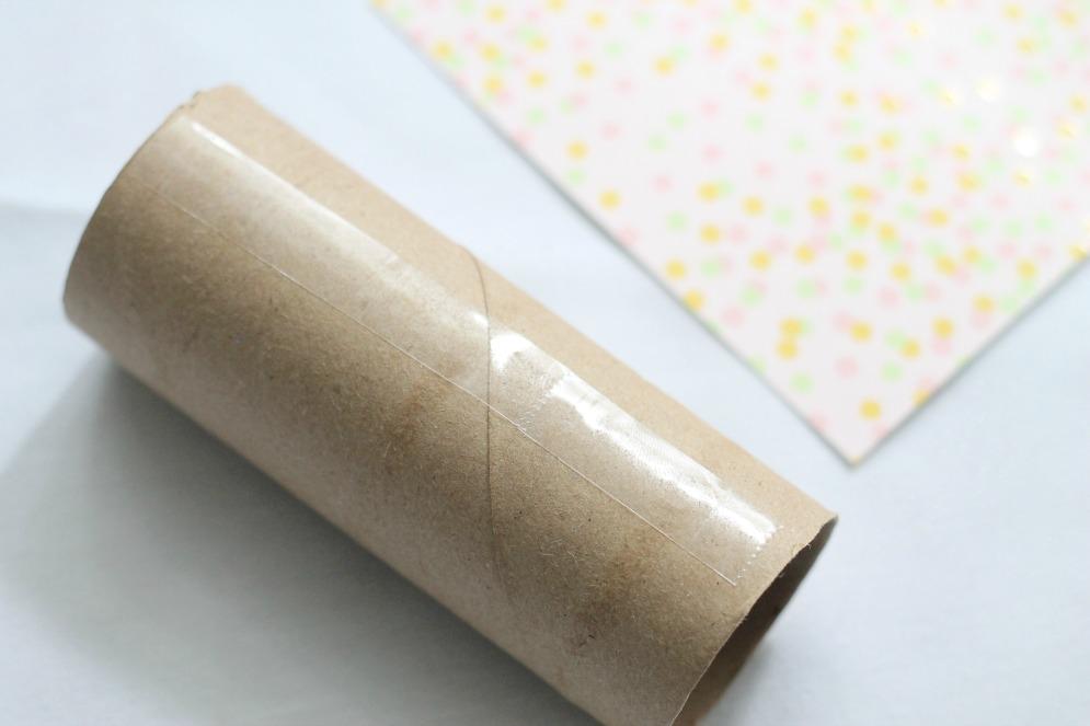 DIY-Confetti-Popper-securing-scrapbook-paper