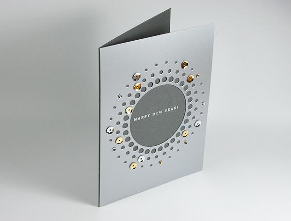 Tarjeta felicitación año nuevo con troquel y sequins