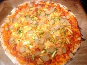 Pizza con Rebozuelos y Salchichas vegetales.