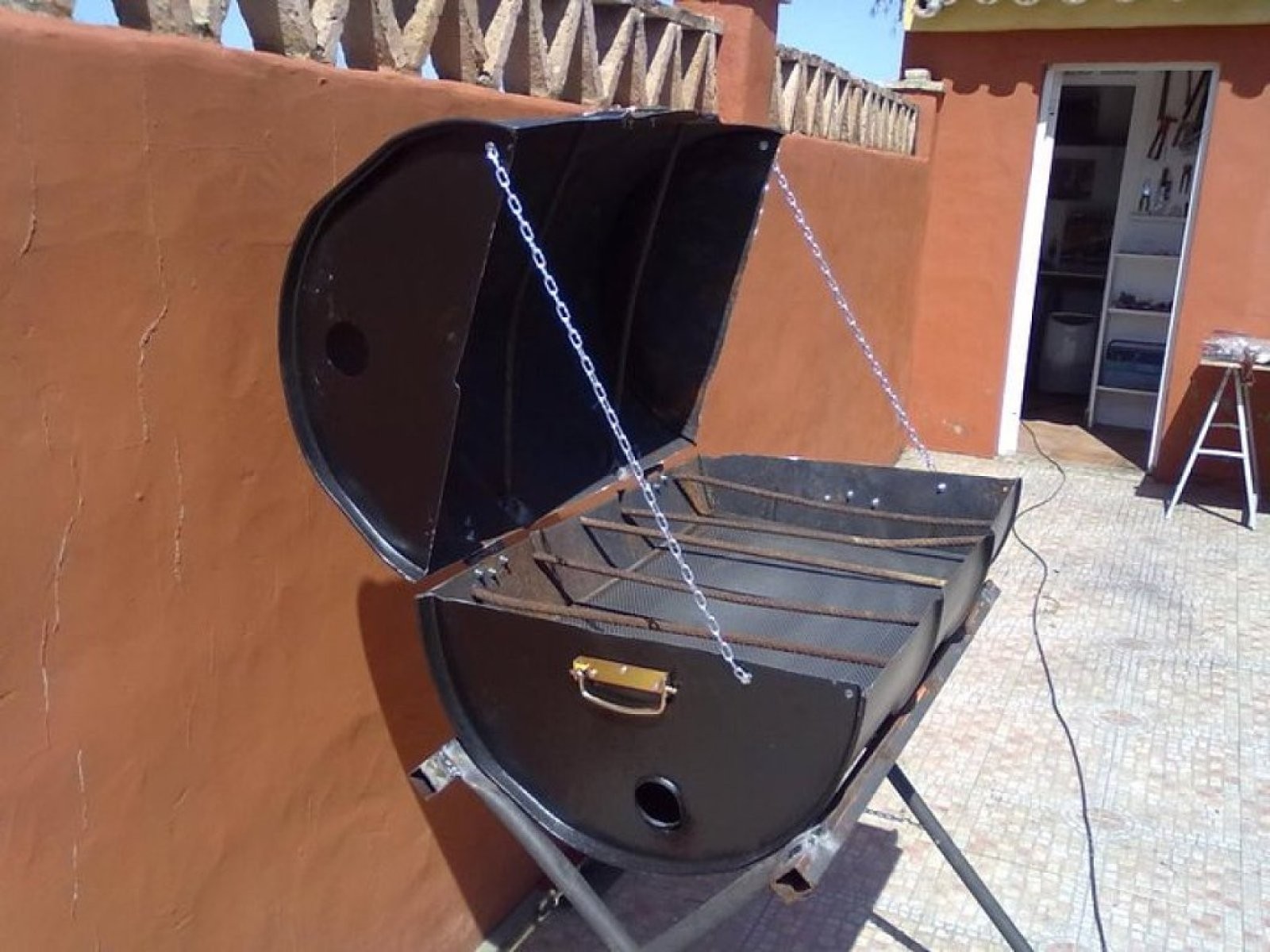 Cómo hacer una barbacoa de barril
