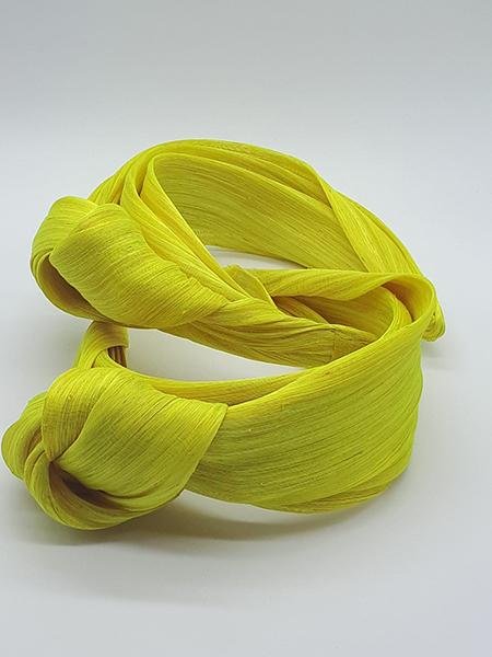 Diademas nudo de seda en amarillo
